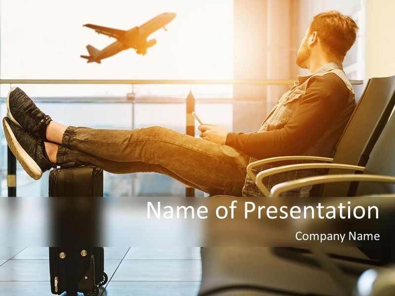 Man Sitting on Chair with Feet on Luggage and Looking at Airplane - Google Slides theme and PowerPoint template

