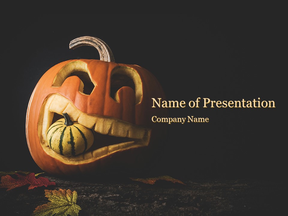 Halloween Carved Pumpkin in Darkness - Free Google Slides theme and PowerPoint template -- Free Halloween Presentation
